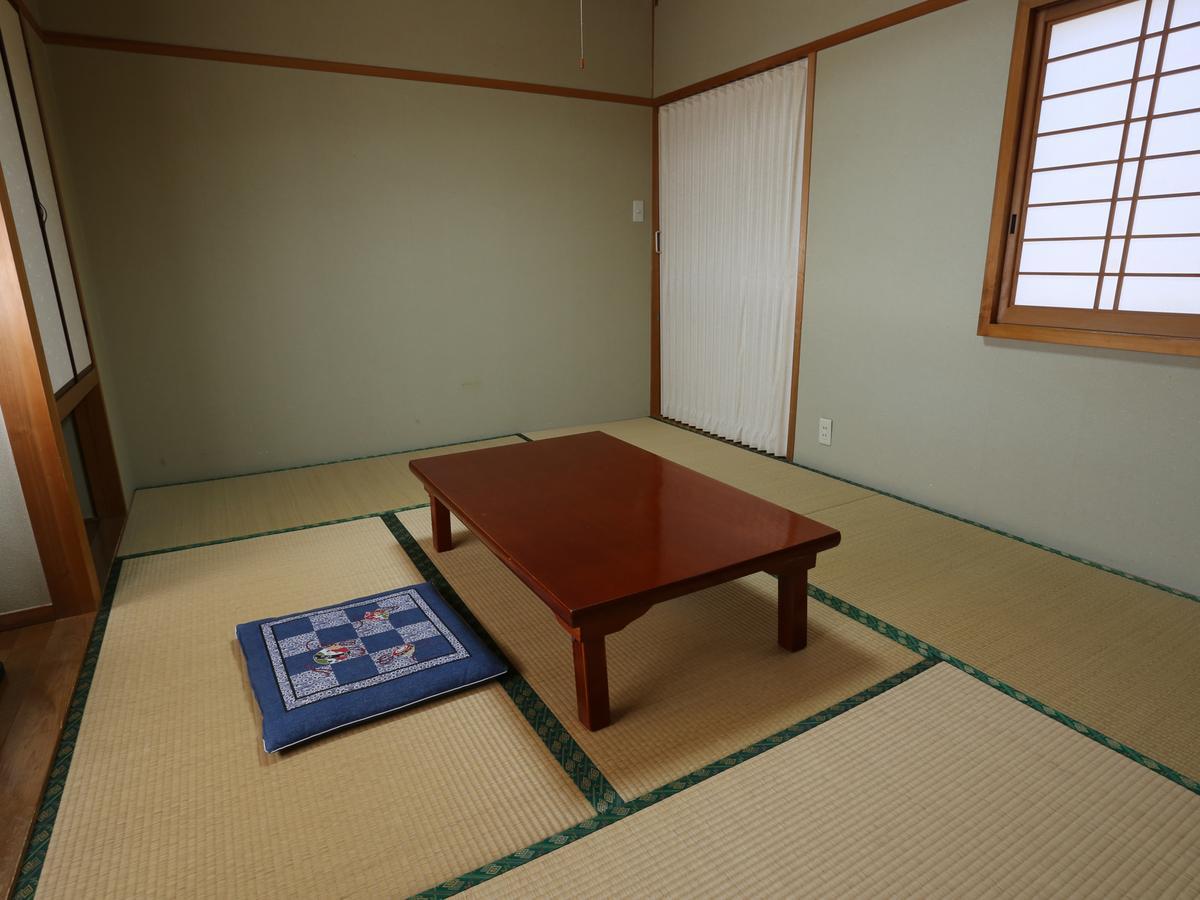 Hôtel Minshuku Unzen Extérieur photo